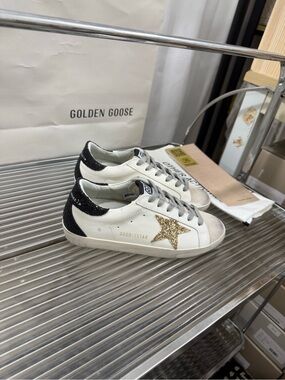 Golden Goose White Leather Sneakers with Black Heel and Gold Glitter Star